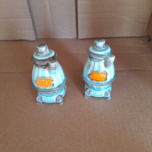 Ceramic wood burning stove salt and pepper shakers